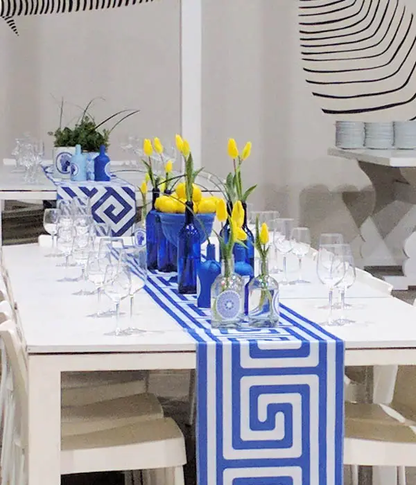 Greek-Inspired Wedding Table Arrangement in Blue, White, and Yellow.