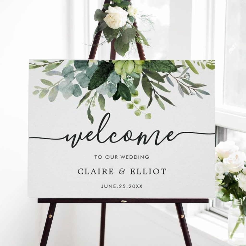 painted watercolor eucalyptus and green leaves wedding welcome sign
