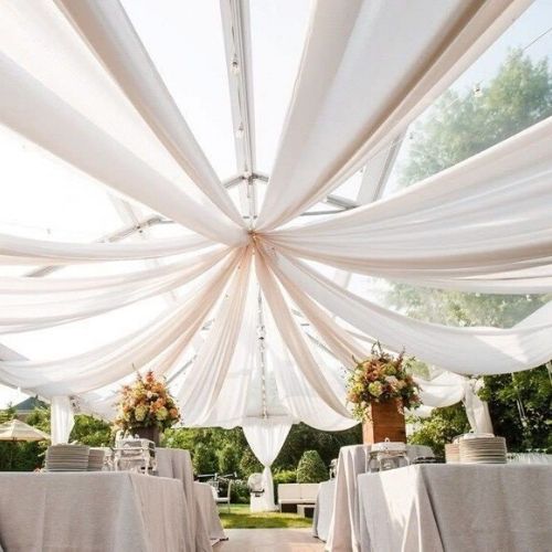 Intimate Backyard Wedding draping sheer voile sealing for shading