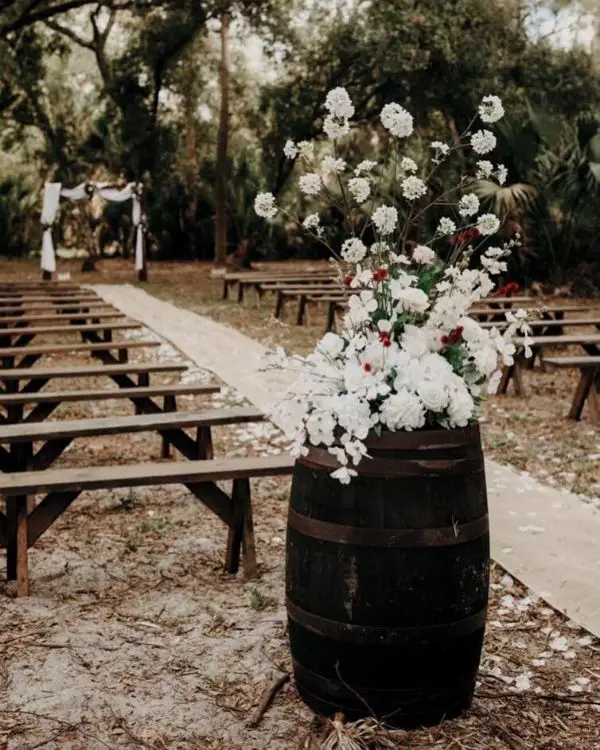 BOHO FALL WEDDING wine barrels, White Flowers, Burgundy Carnation Flowers, and Runner Aisle Decorations