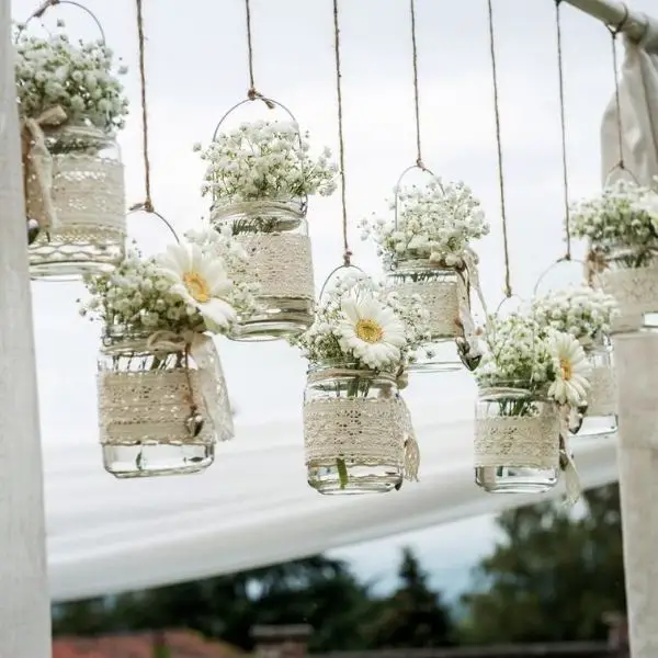 DIY Backyard Wedding Decorations On a Budget Floating Mason Jars Decoration with lace ribbon 