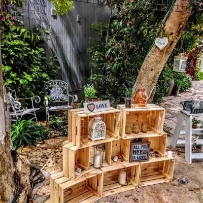 DIY Backyard Wedding Decorations On a Budget. Wood Crates and small decor items for venue entrance 