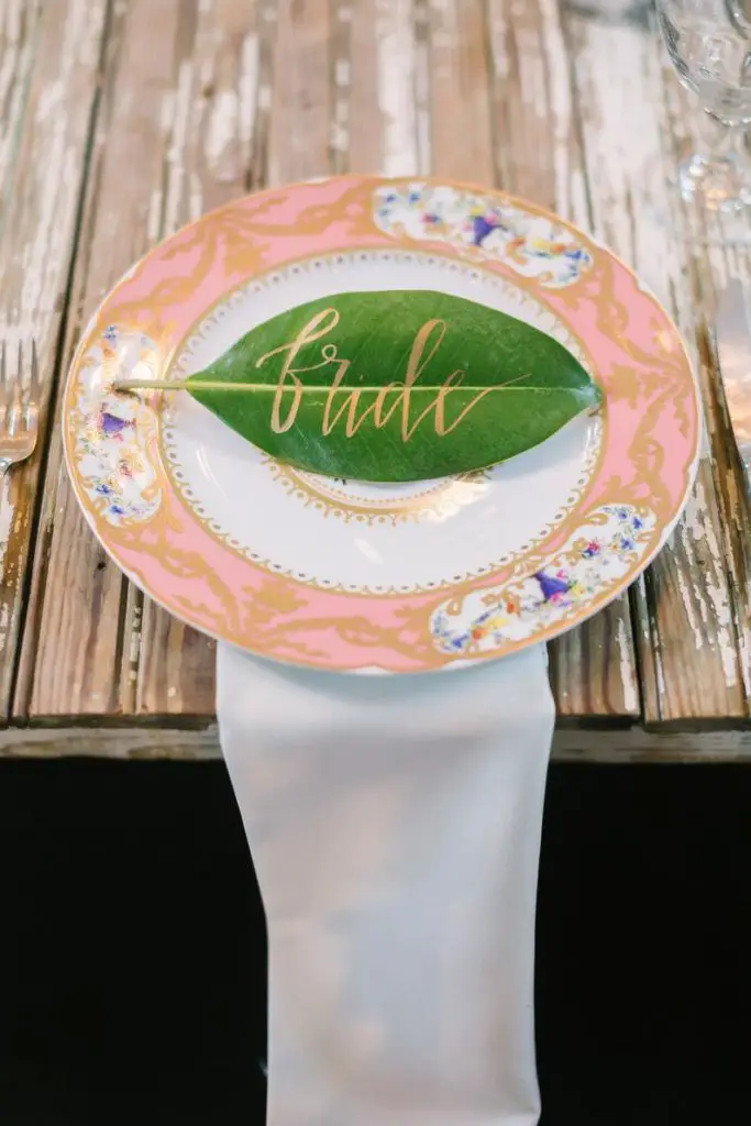 DIY Backyard Wedding Decorations On a Budget Leaves Place Cards using an acrylic paint marker