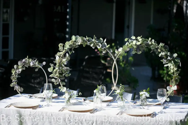 DIY Backyard Wedding Decorations On a Budget small greenery Hoops Centerpiece 