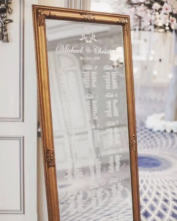 DIY Backyard Wedding Decorations On a Budget Mirror Seating Charts
