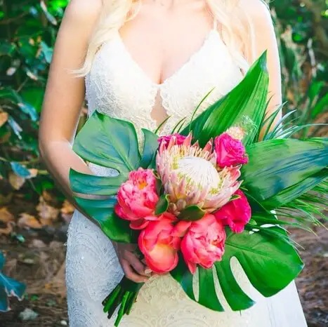 Best Seasonal Flowers for July Wedding Bouquet -  Coral Peony Tropical beach wedding bouquet