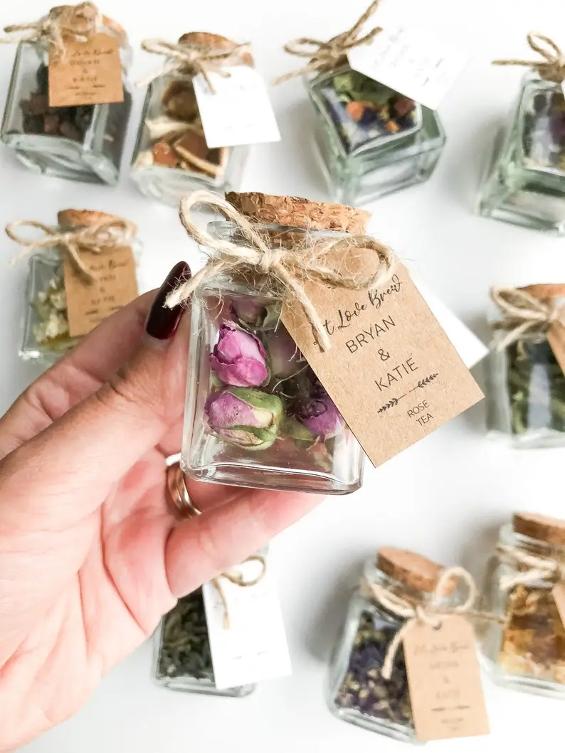a mix of blooming flowers and colorful loose leaf tea as DIY Tea Jars bridal shower favors